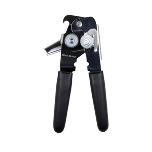 A heavy-duty, chrome-plated manual can opener with black ergonomic handles and a "MADE IN USA" stamp visible on the metal frame.