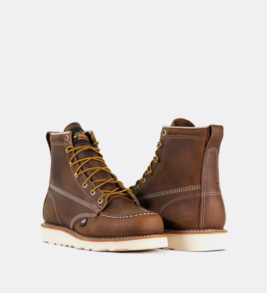Thorogood American Heritage 6-inch tobacco tan leather moc toe work boots on a white background.