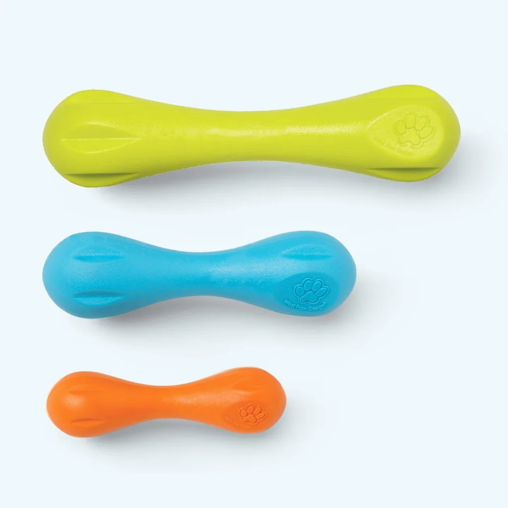 West Paw Zogoflex Hurley dog bone toy in bright orange pliable material.