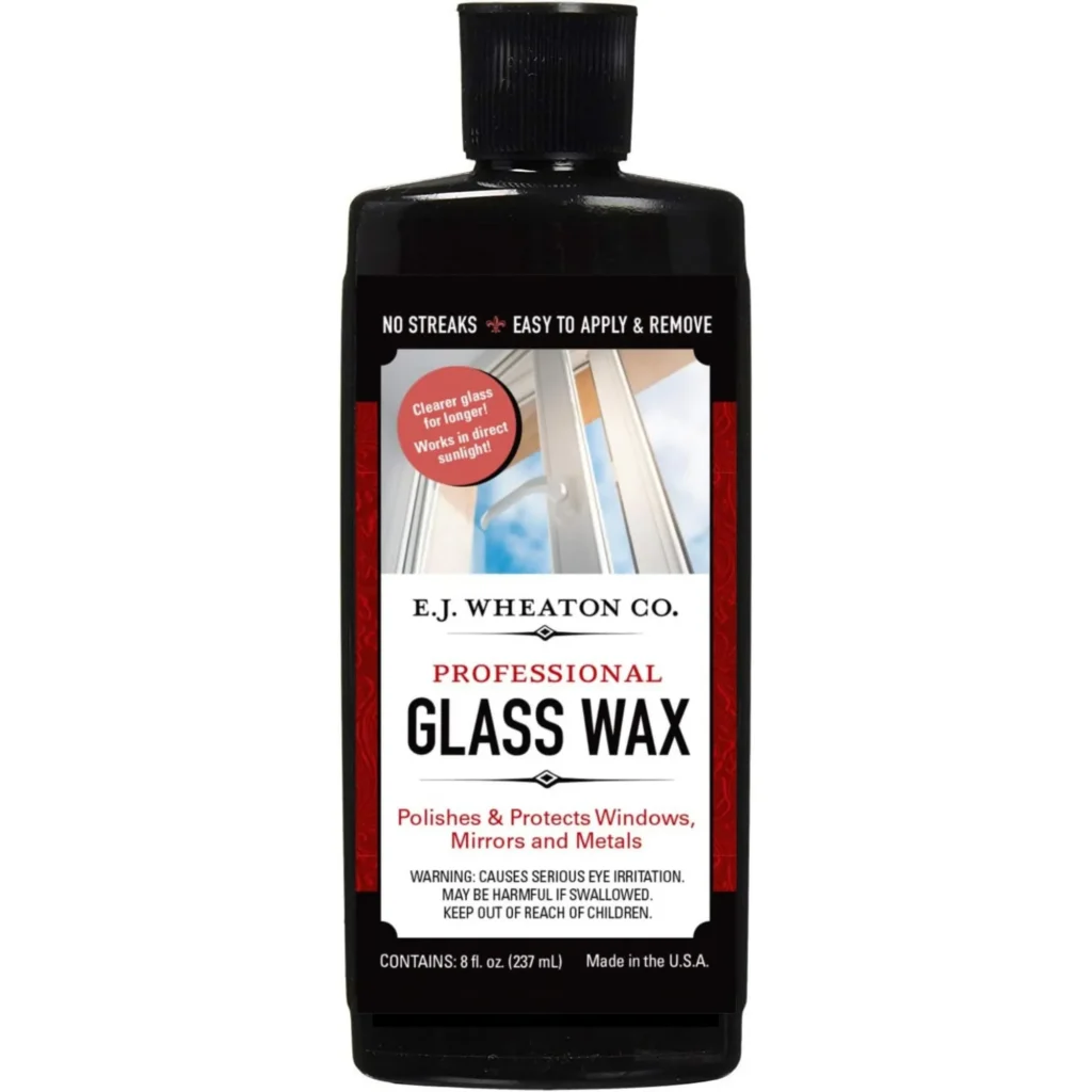 Professional Glass Wax canister on a plain background for window and metal polishing.